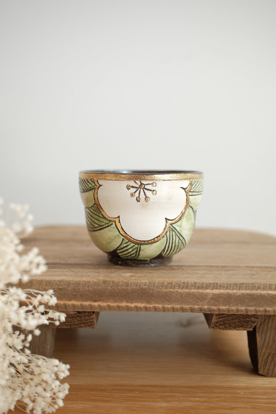 Cool Banana Black Pottery with Gold Detailing Tea Cup