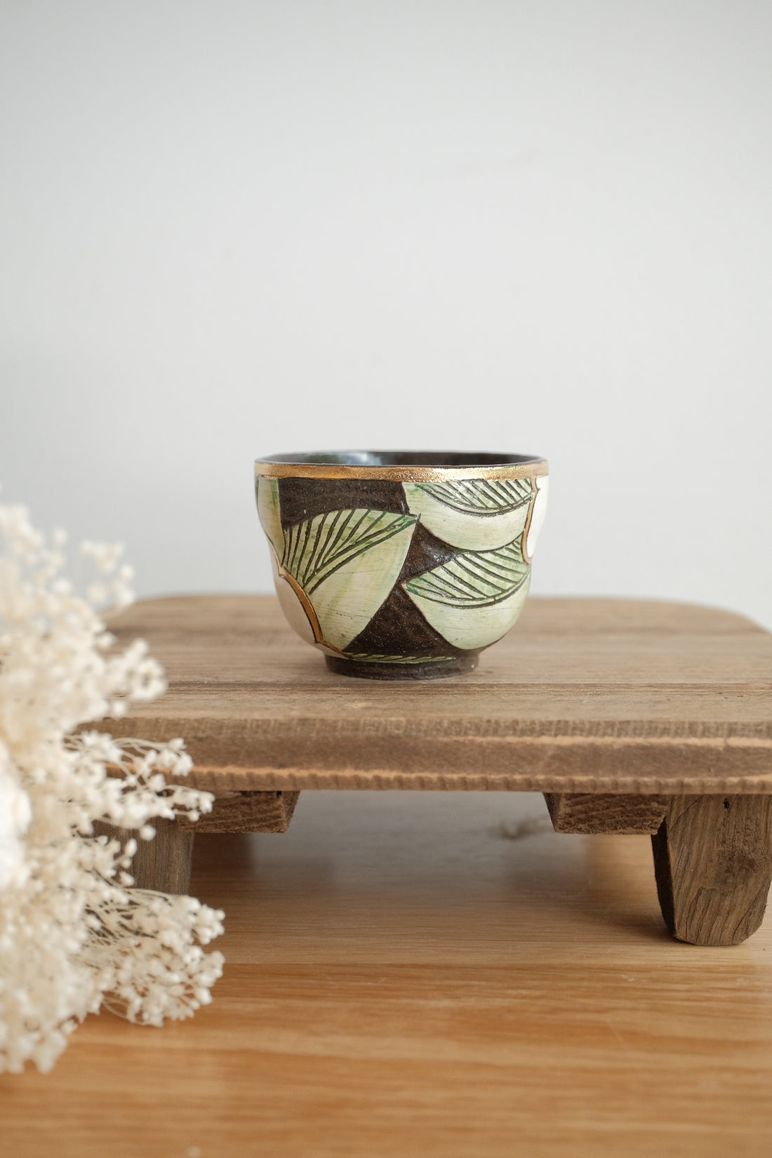 Cool Banana Black Pottery with Gold Detailing Tea Cup