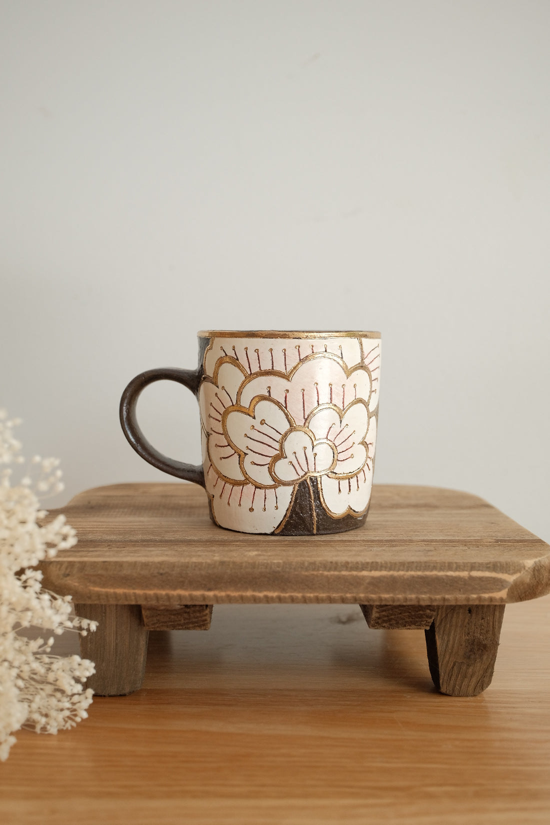 Cool Banana Black Pottery with Gold Detailing Mug - Camellia