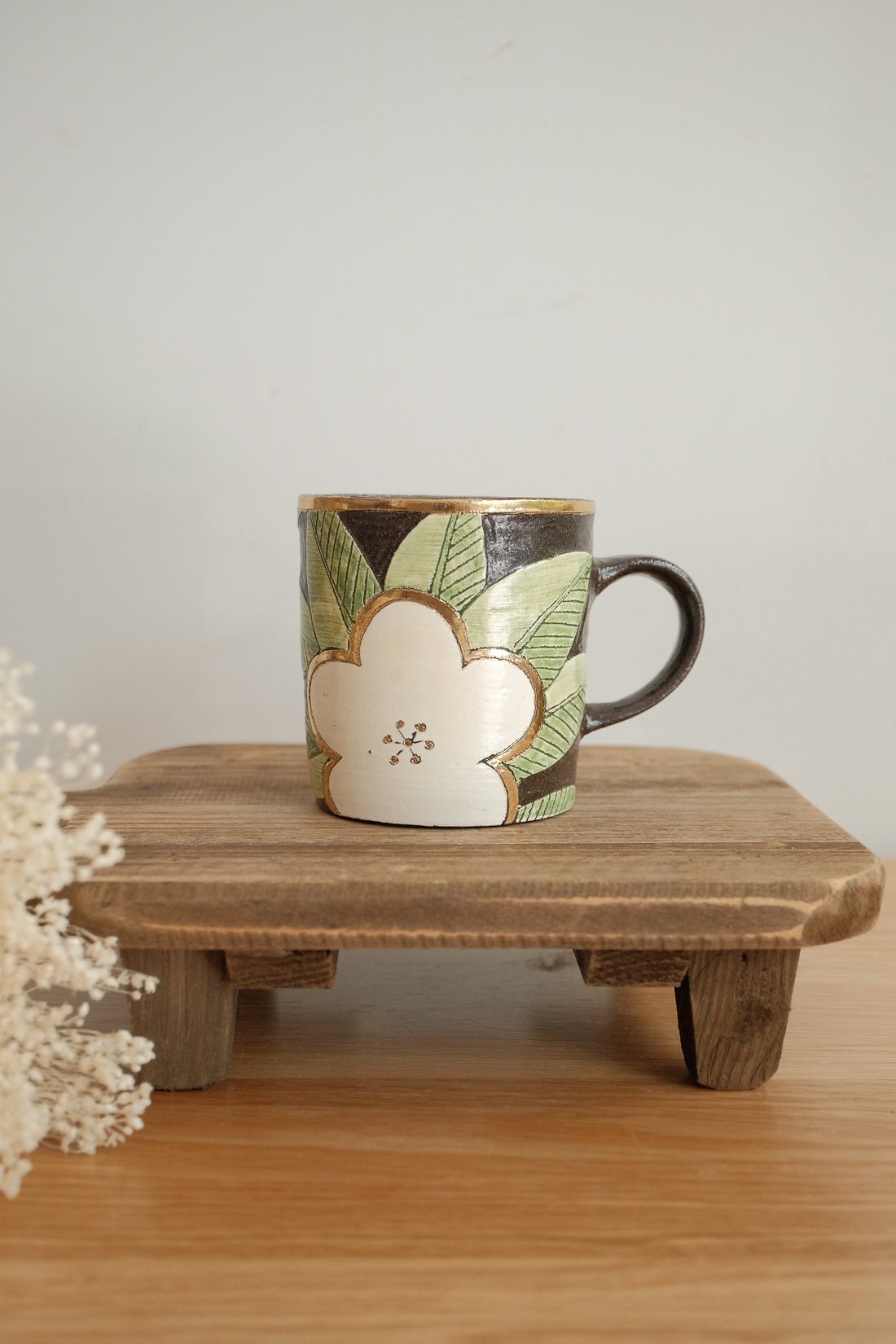 Cool Banana Black Pottery with Gold Detailing Mug - Flower