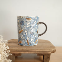 Cool Banana Black Pottery with Gold Detailing Blue Flower Tall Mug with Lid