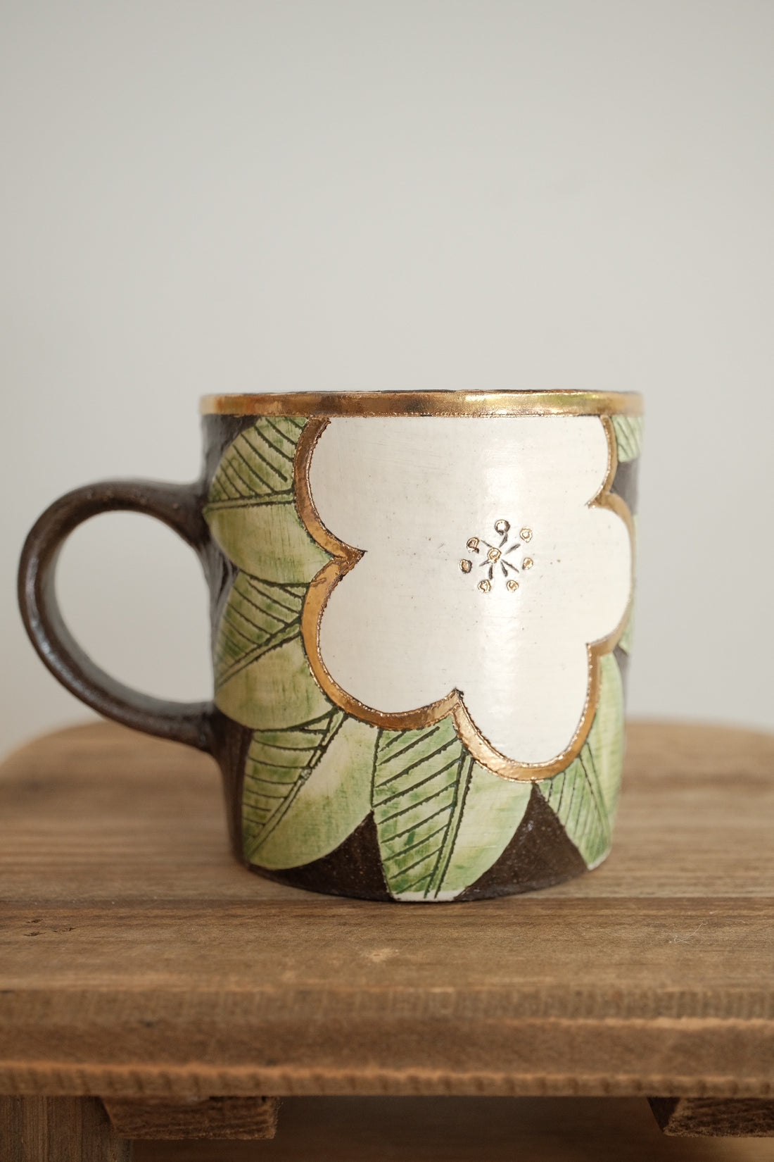 Cool Banana Black Pottery with Gold Detailing Mug - Flower