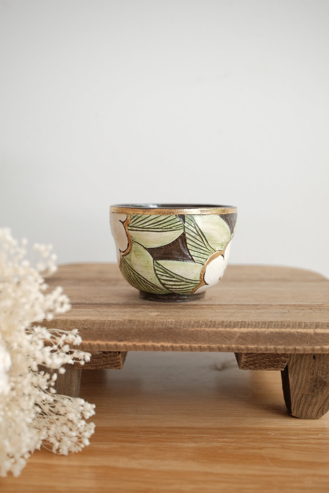 Cool Banana Black Pottery with Gold Detailing Tea Cup