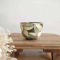 Cool Banana Black Pottery with Gold Detailing Tea Cup