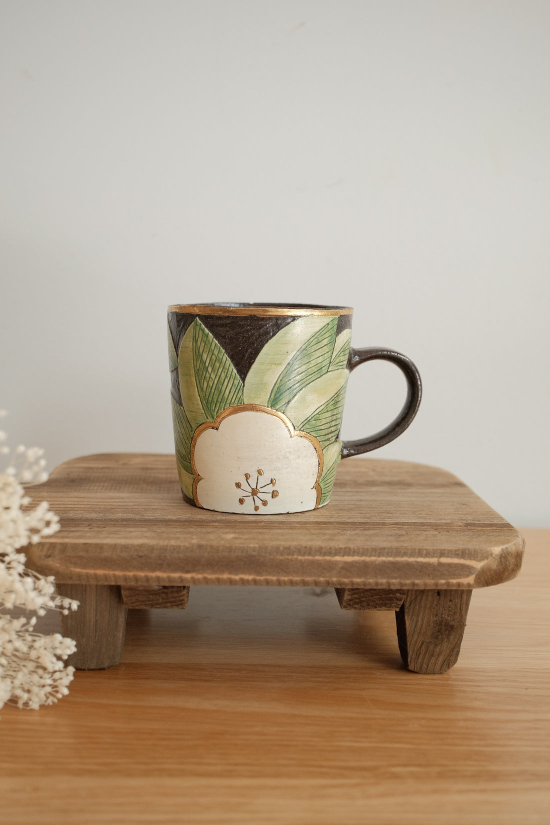 Cool Banana Black Pottery with Gold Detailing Mug - Flower